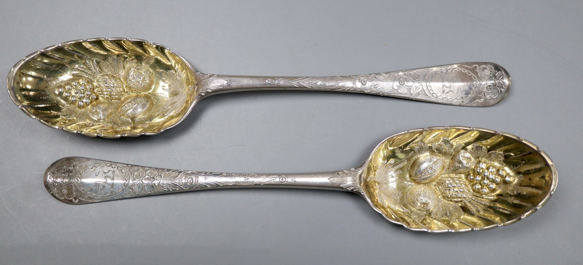 A pair of early George III Scottish silver Hanovarian pattern berry spoons, John Clark, Edinburgh, 1760, 21.5cm, 149 grams.